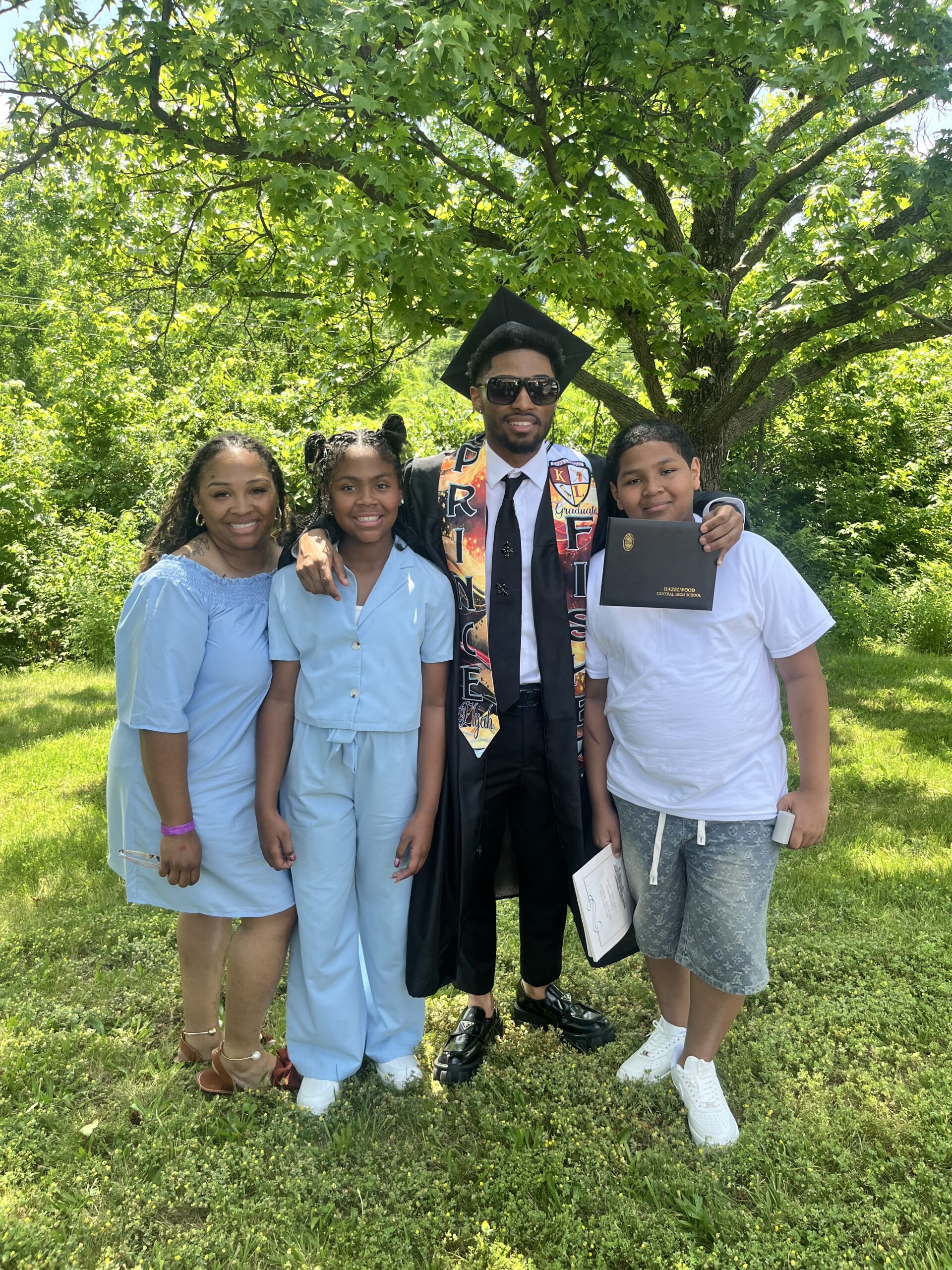 Jasmine family photo 2026 LifeWise StL economic wellness IDA home buying debt reduction